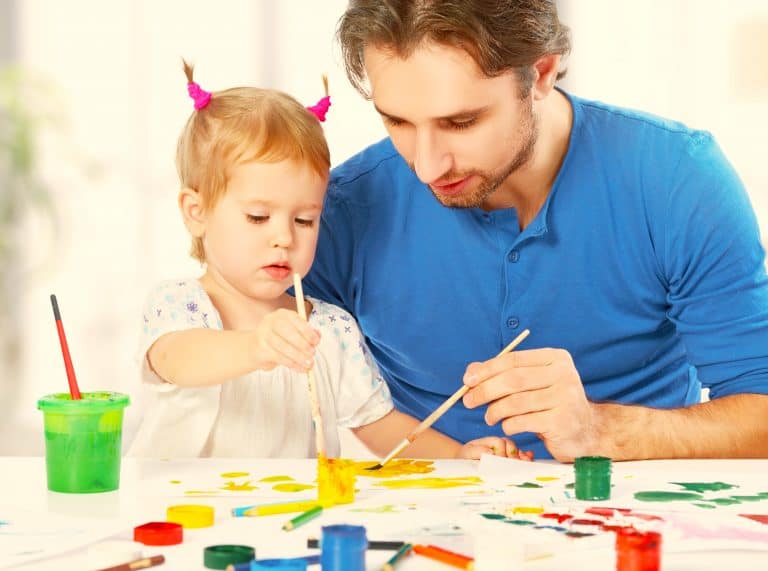 Happy Family Father And Child Daughter Together Draw Paints