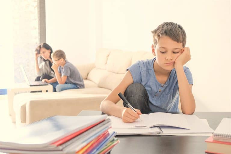 Kids Doing School Homework At Home. Mother Helping Her Teenager Son With Homework. Online Learning,